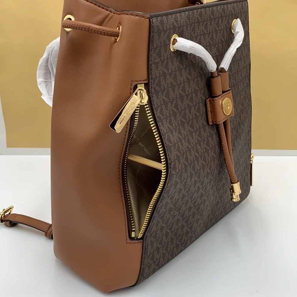 MICHAEL KORS PHOEBE MEDIUM DRAWSTRING BACKPACK BROWN SIGNATURE COLOR